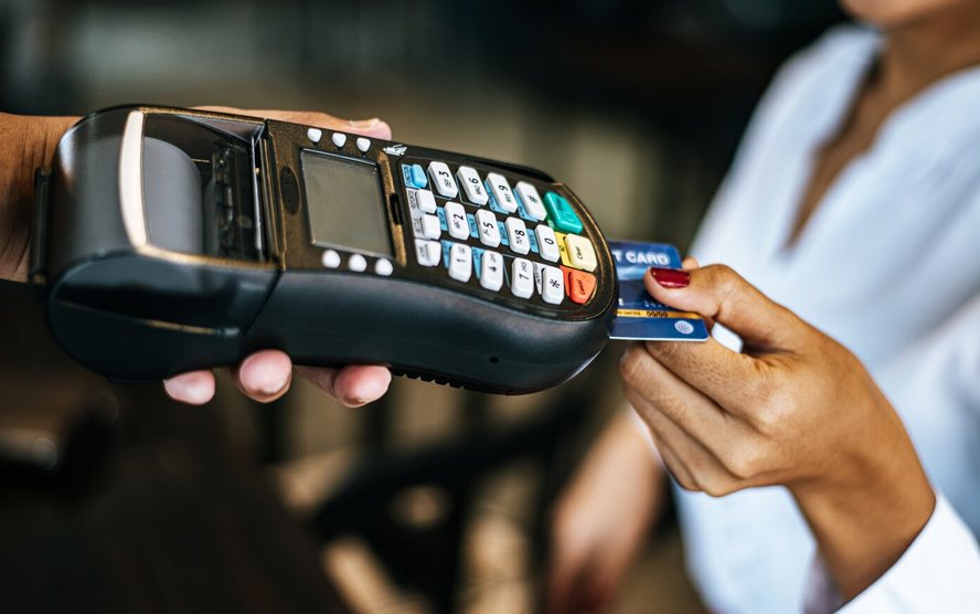 Cashier taking payment at reception